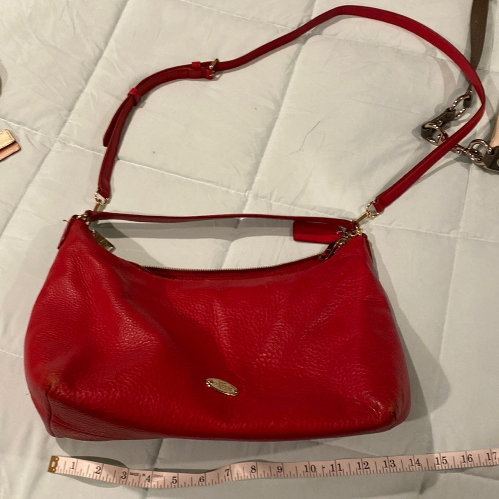 red with gold hardware attached short strap with a removable long straps